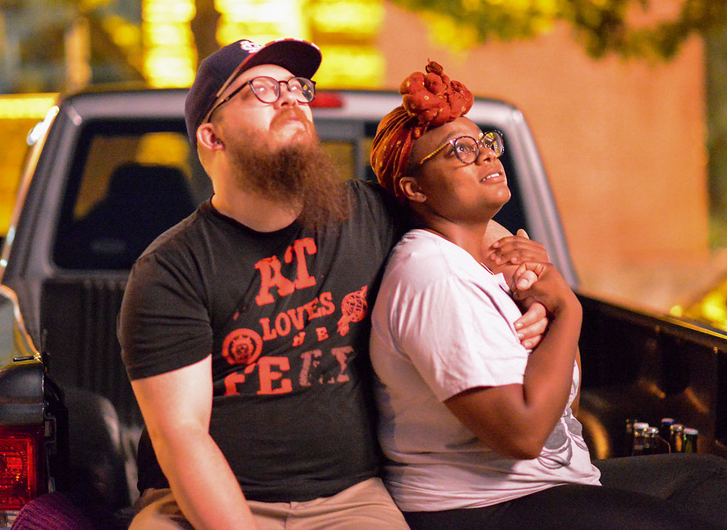 Spencer Lester and Chynna McCall watch the Fire in the Sky fireworks display